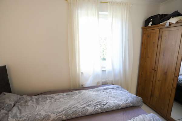 Helle Erdgeschosswohnung mit Terrasse und Garten! — Bild 11 von 15