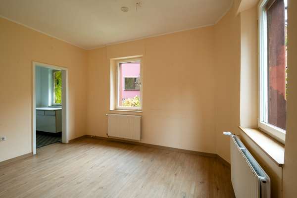 Zwei Häuser auf ca. 1.025 m² – Mehrfamilienhaus + Altbau mit Entwicklungs- und Renditepotenzial — Bild 13 von 42