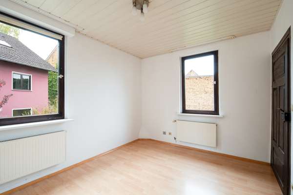 Zwei Häuser auf ca. 1.025 m² – Mehrfamilienhaus + Altbau mit Entwicklungs- und Renditepotenzial — Bild 15 von 42