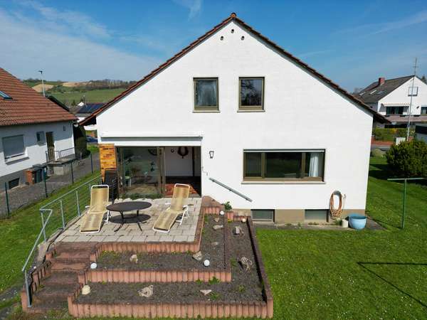 Charmantes freistehendes Einfamilienhaus in beliebter Lage von Harxheim! — Bild 5 von 21