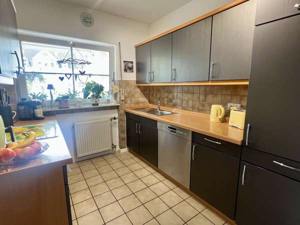 Wohlfühlort: Sonnige 3-Zimmerwohnung mit Tiefgaragenplatz in begehrter Hechtsheimer Feldrandlage — Bild 8 von 14