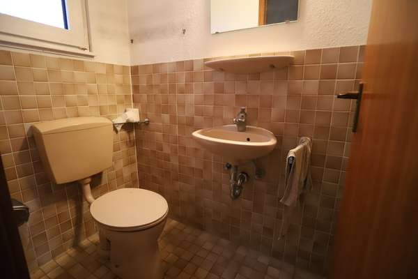 Solides Reihenmittelhaus mit großem Potenzial in Bischofsheim! — Bild 5 von 15