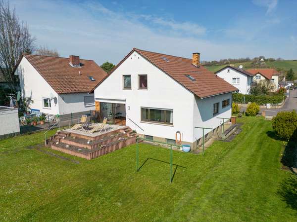 Charmantes freistehendes Einfamilienhaus in beliebter Lage von Harxheim! — Bild 3 von 21