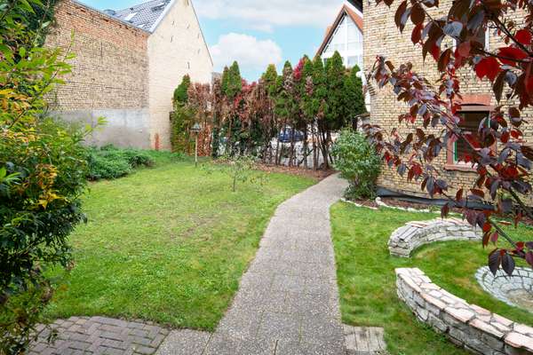 Zwei Häuser auf ca. 1.025 m² – Mehrfamilienhaus + Altbau mit Entwicklungs- und Renditepotenzial — Bild 7 von 42