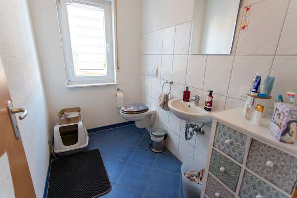 Familienfreundliches Einfamilienhaus auf 2 Ebenen mit großer Terrasse, Garten und Garage — Bild 16 von 18