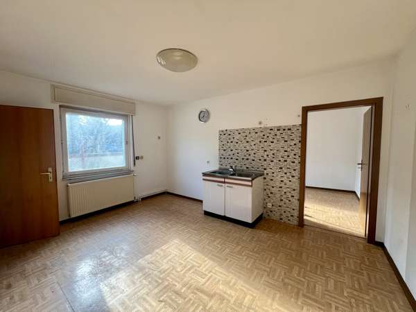 Ein Ort zum Gestalten – Einfamilienhaus mit Dachterrasse in Breckenheim — Bild 11 von 28