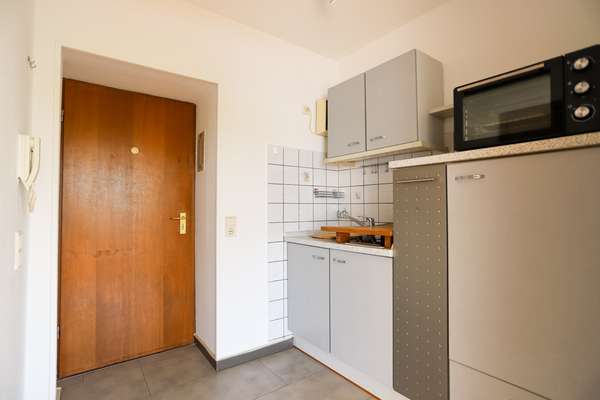 Bezugsfreie 1 Zimmer Wohnung mit traumhafter Dachterrasse — Bild 10 von 16