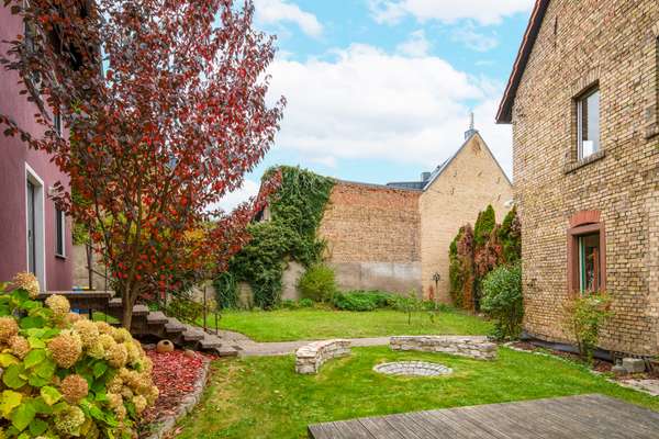 Zwei Häuser auf ca. 1.025 m² – Mehrfamilienhaus + Altbau mit Entwicklungs- und Renditepotenzial — Bild 6 von 42