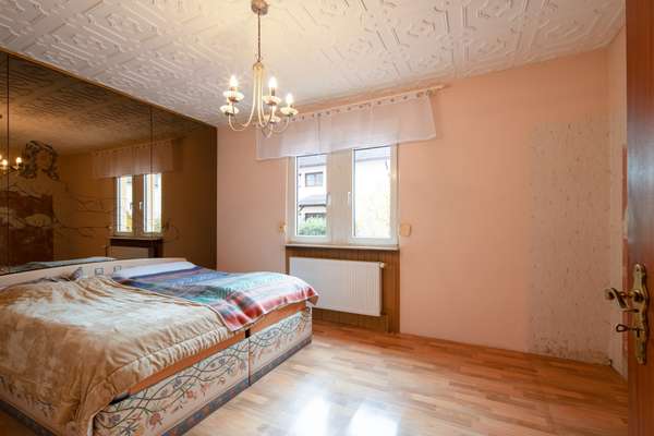 Für Investoren oder Eigennutzer: Charmantes Mehrfamilienhaus in zentraler Lage von Rüsselsheim — Bild 8 von 29