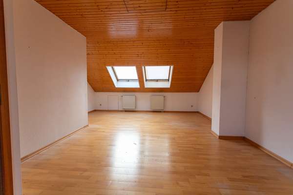 Solides Reihenmittelhaus mit großem Potenzial in Bischofsheim! — Bild 13 von 15