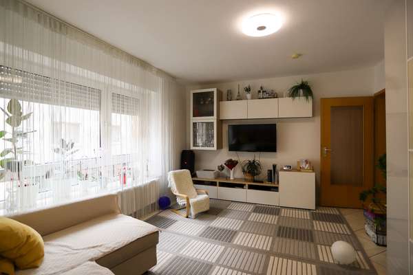 Investieren in Vielseitigkeit: Mehrfamilienhaus mit attraktiver Ladenfläche in Mainz-Kastel — Bild 10 von 24