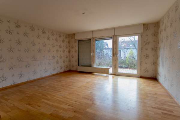 Solides Reihenmittelhaus mit großem Potenzial in Bischofsheim! — Bild 3 von 15
